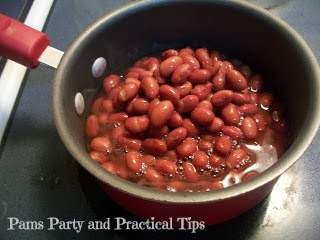 Preparing the beans for the burritos