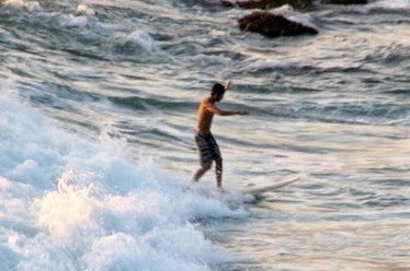 Surfing at Bali Beach