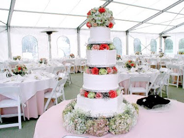 imprint wedding cake with fresh flowers