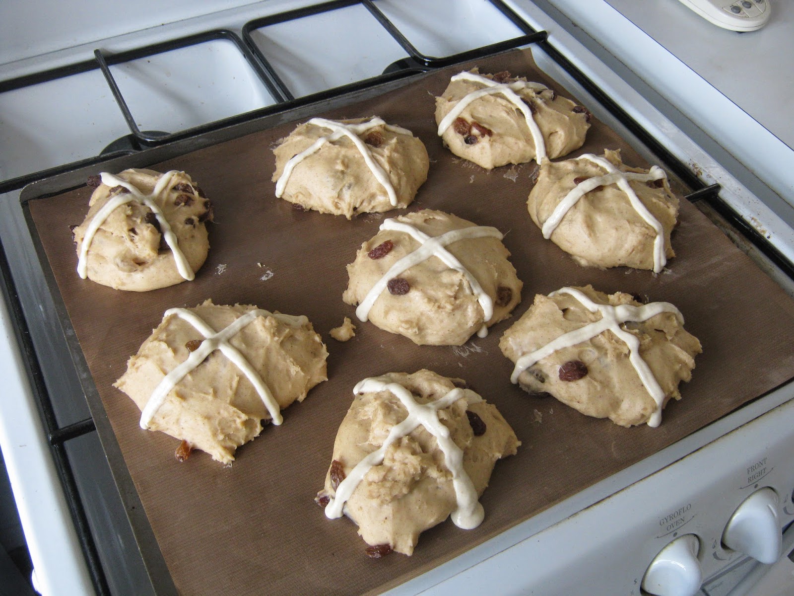 The hot cross buns ready to go in the oven