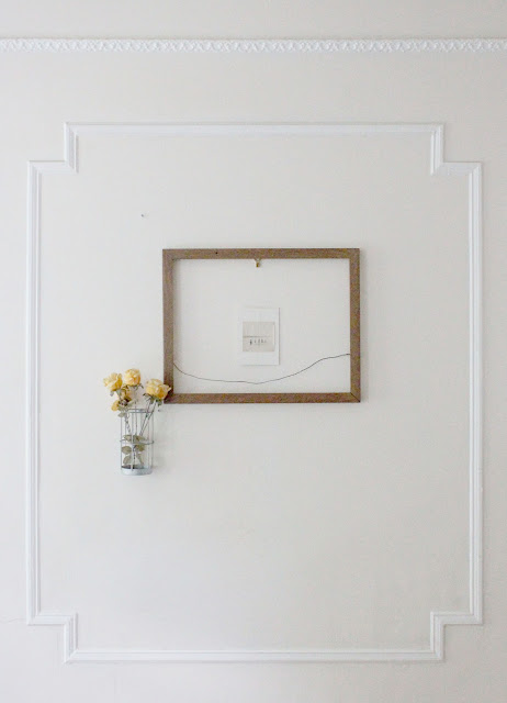 flowers and trash-picked frame with vintage photograph, brooklyn new york wall decor by jersey ice cream co.