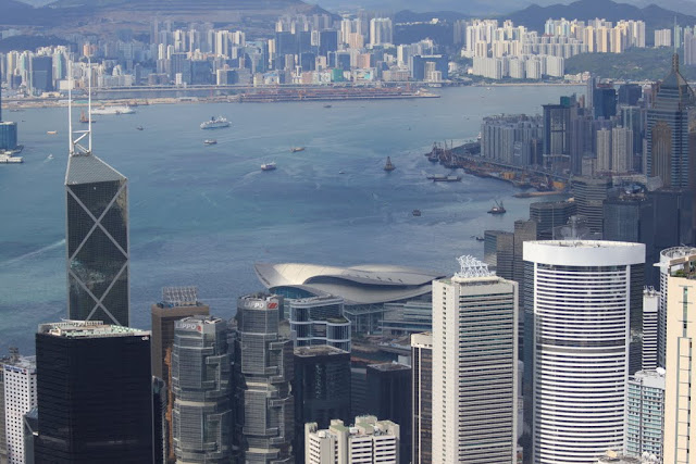 Bank of China Tower, Central Plaza (far right) and Hong Kong Convention and Exhibition Centre from the viewing platform of Sky Terrance 428 at The Peak Tram in Hong Kong Bank of China Tower, Central Plaza (far right) and Hong Kong Convention and Exhibition Centre from the viewing platform of Sky Terrance 428 at The Peak Tram in Hong Kong