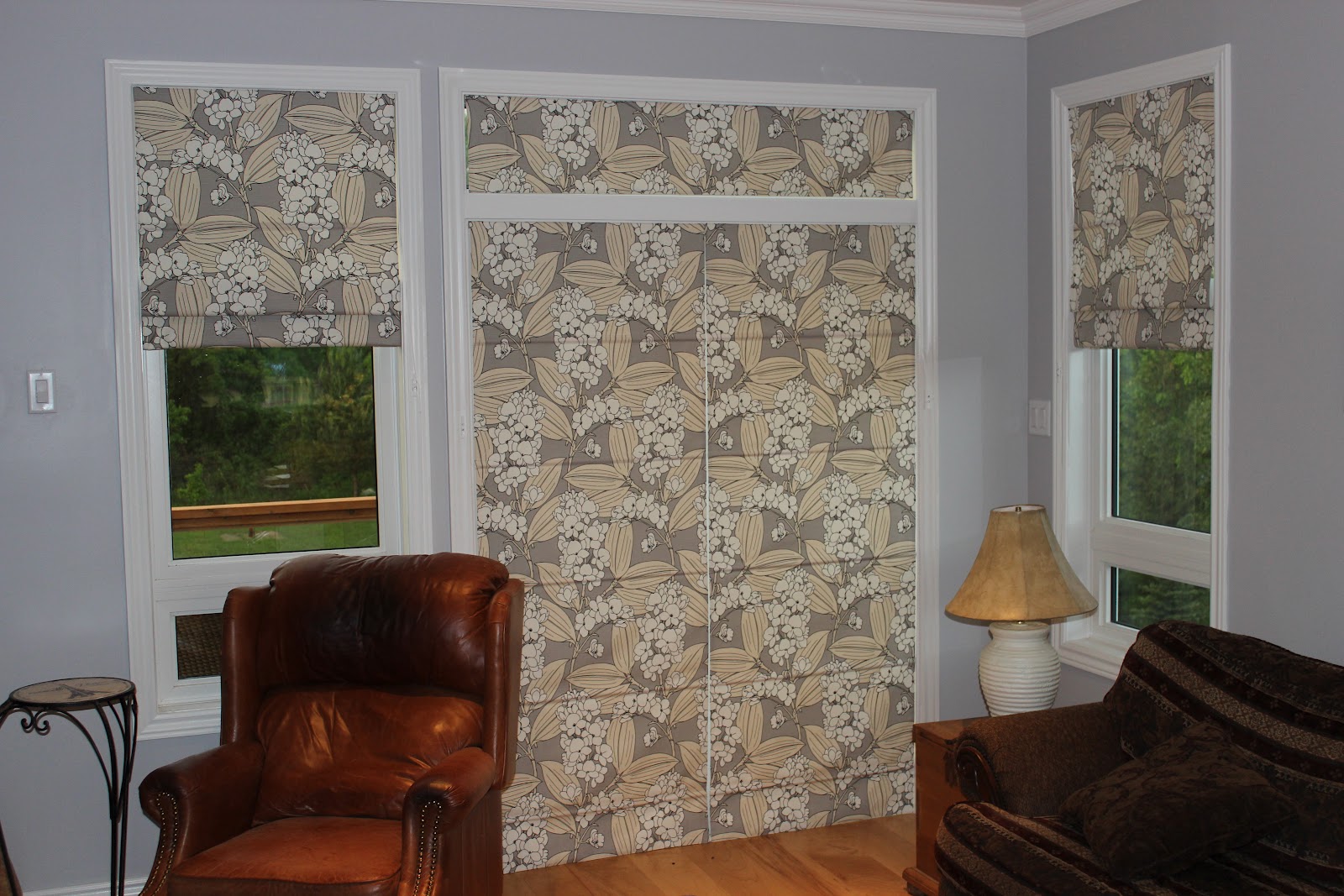 Custom Interiors Roman Shades In A Patio Door