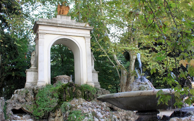 The garden with a fountain at Villa Borghese in Rome, Italy The garden with a fountain at Villa Borghese in Rome, Italy