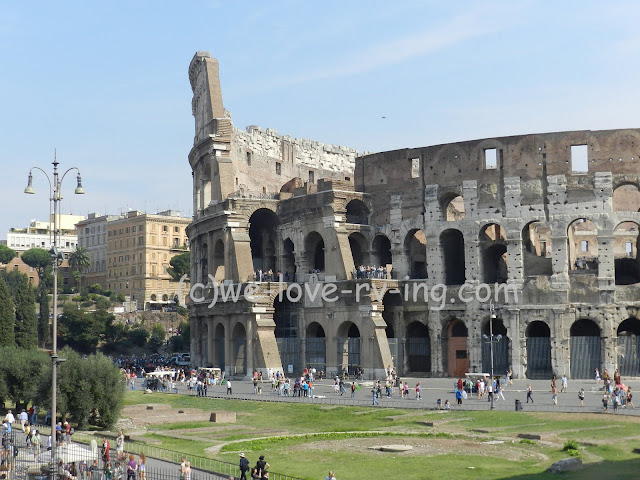 This shows a different view of the Colosseum from the Arc di Constantine