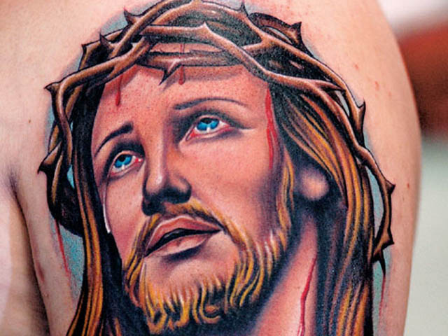 1. Jesus Arm Tattoo Designs - wide 1