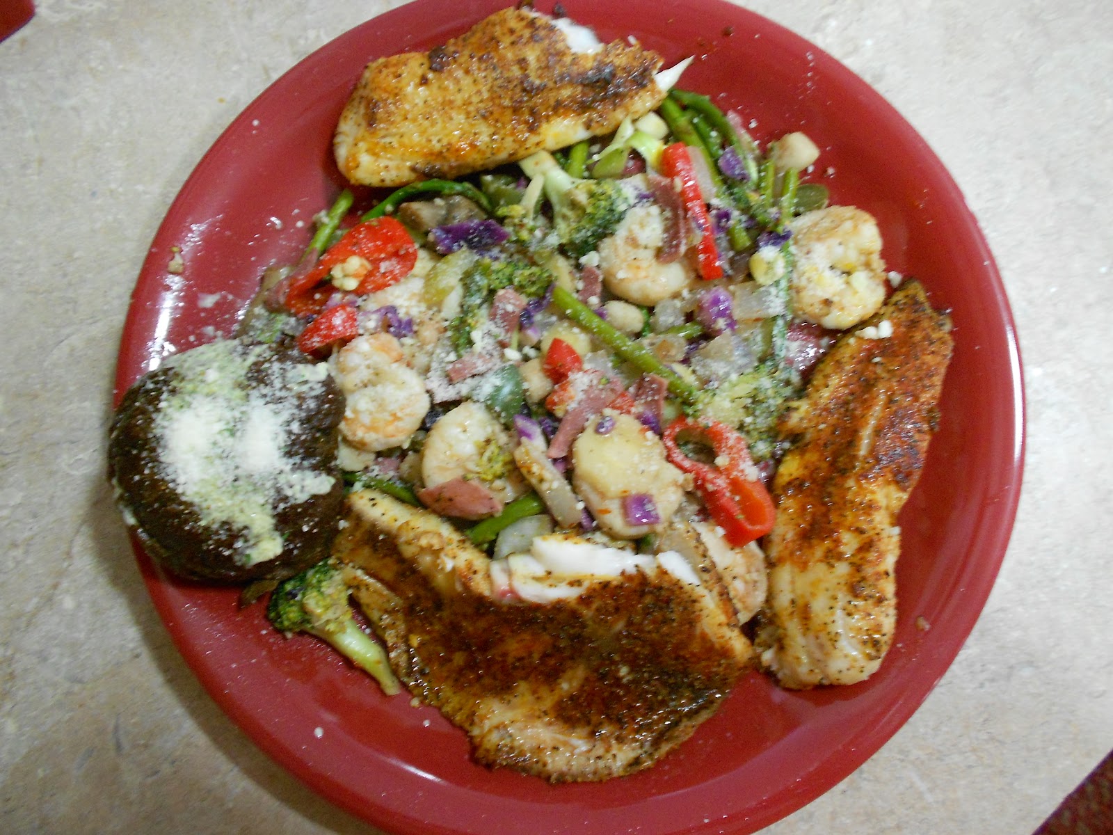 Key Recipes Pan seared tilapia w/ shrimp, scallops and veggies!