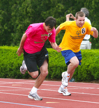 TRI-TOWN SPECIAL OLYMPICS  ATHLETE IN 50 M DASH