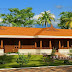 Traditional Kerala villa with slopping roof pattern