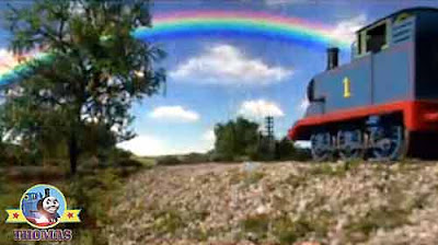 Thomas and friends Annie & Clarabel wooden coaches colorful rainbow high up vivid the summer sky