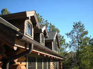 Renovation "after" picture, new "doghouse" dormers https://huismanconcepts.com/