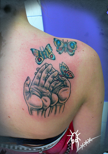 Women+tattoos+on+back