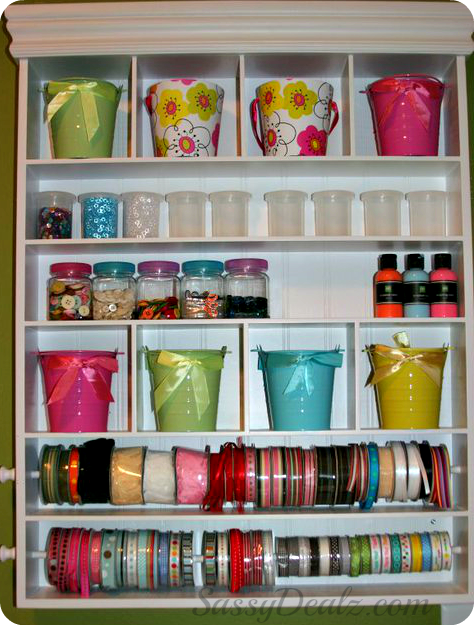 organizing craft supplies with buckets, ribbons, paint for the room