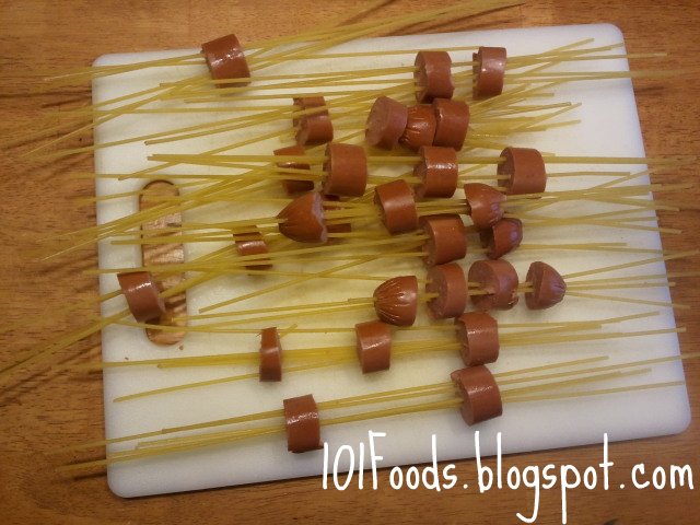 Spaghetti Poked Through Hot Dogs Spaghetti Poked Through Hot Dogs