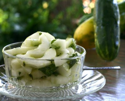 Julia Child's Cucumber salad, garden cucumbers soaked in a vinegar, sugar and water mixture.