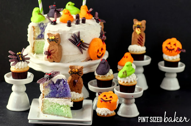 Zombie-fied Peeps on top of a Halloween Cake and Cupcakes. #Halloween #Fun #Peeps