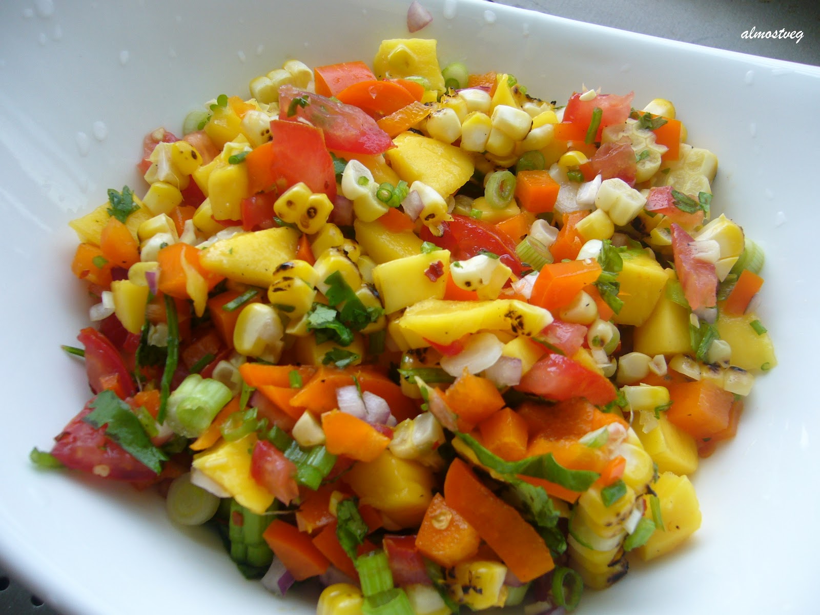 Roasted corn and mango salad 1 cup frozen roasted corn Roasted corn and mango salad 1 cup frozen roasted corn