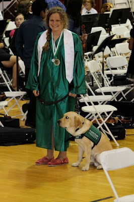 Sophie Mesches and yellow Lab Luigi