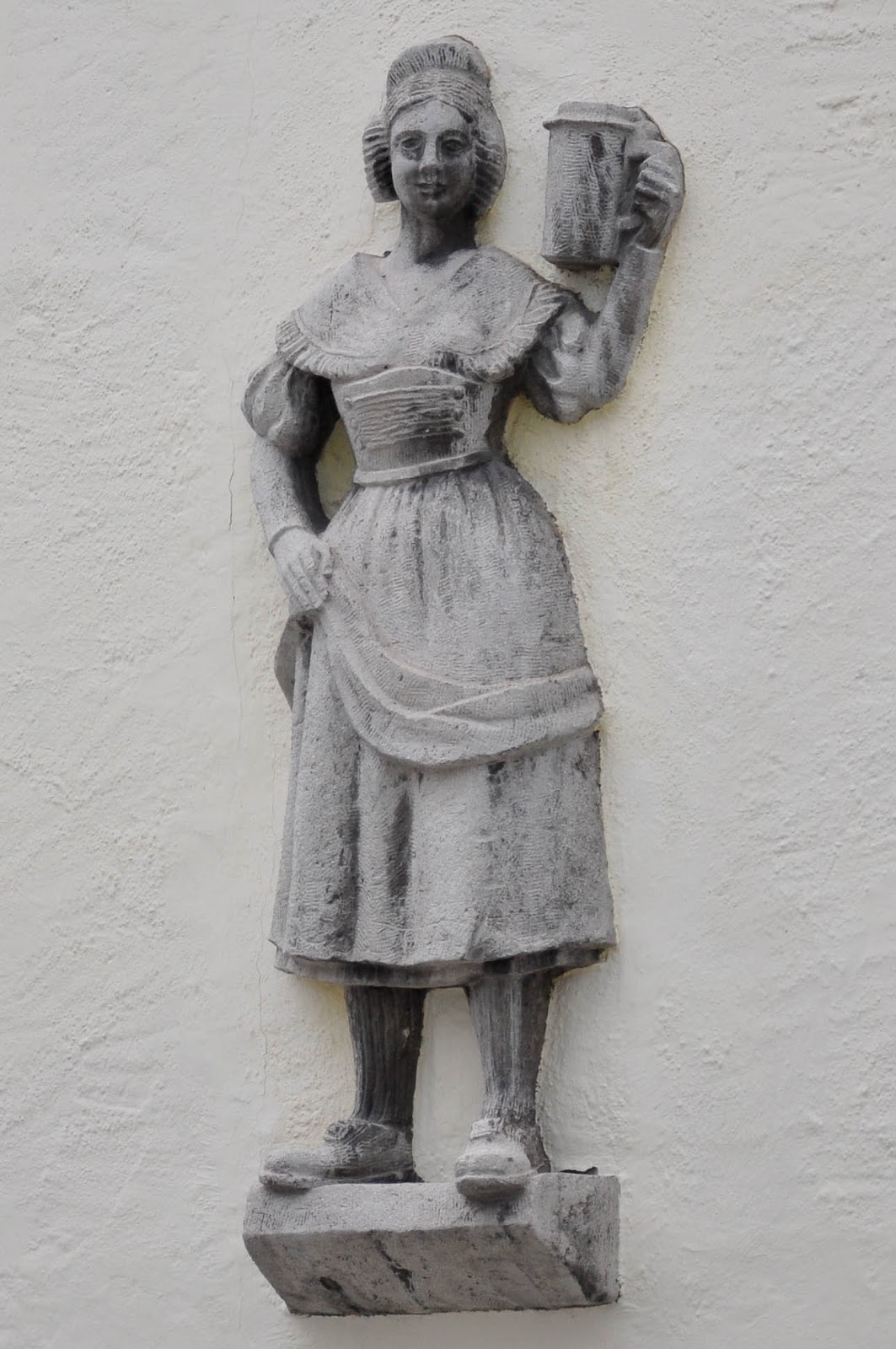 Bas-relief on a house wall, Garmisch-Parternkirchen, Bavaria, Germany
