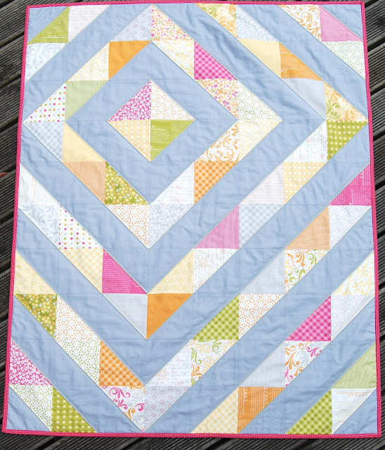 Baby quilt with half square triangles