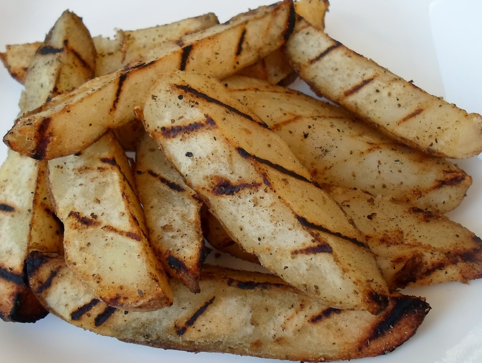 Happier Than A Pig In Mud Grilled Old Bay Potato Wedges