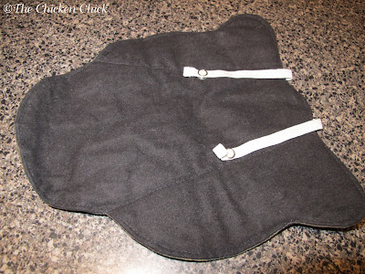 Chicken Saddles & Chicken Diapers. Who knew? Underside of chicken saddle