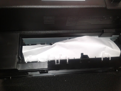 Сморщенная бумага внутри принтера