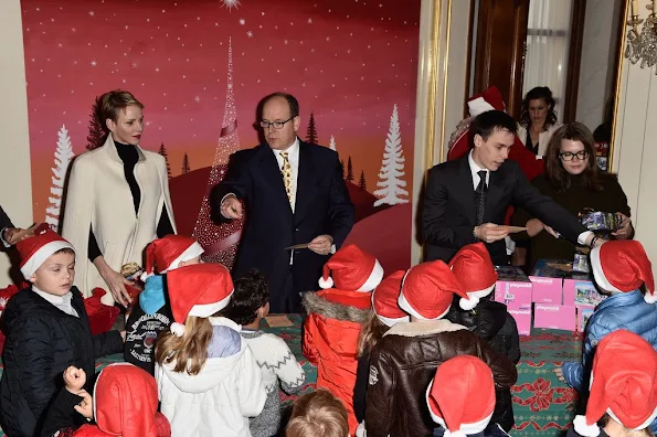 Prince Albert II of Monaco and Princess Charlene of Monaco, Camille Gottlieb and Louis Ducruet attend the Christmas gifts distribution