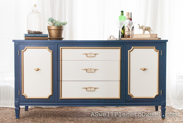Furniture Makeover.  Navy blue, white and gold credenza from www.aswellplacetodwell.com