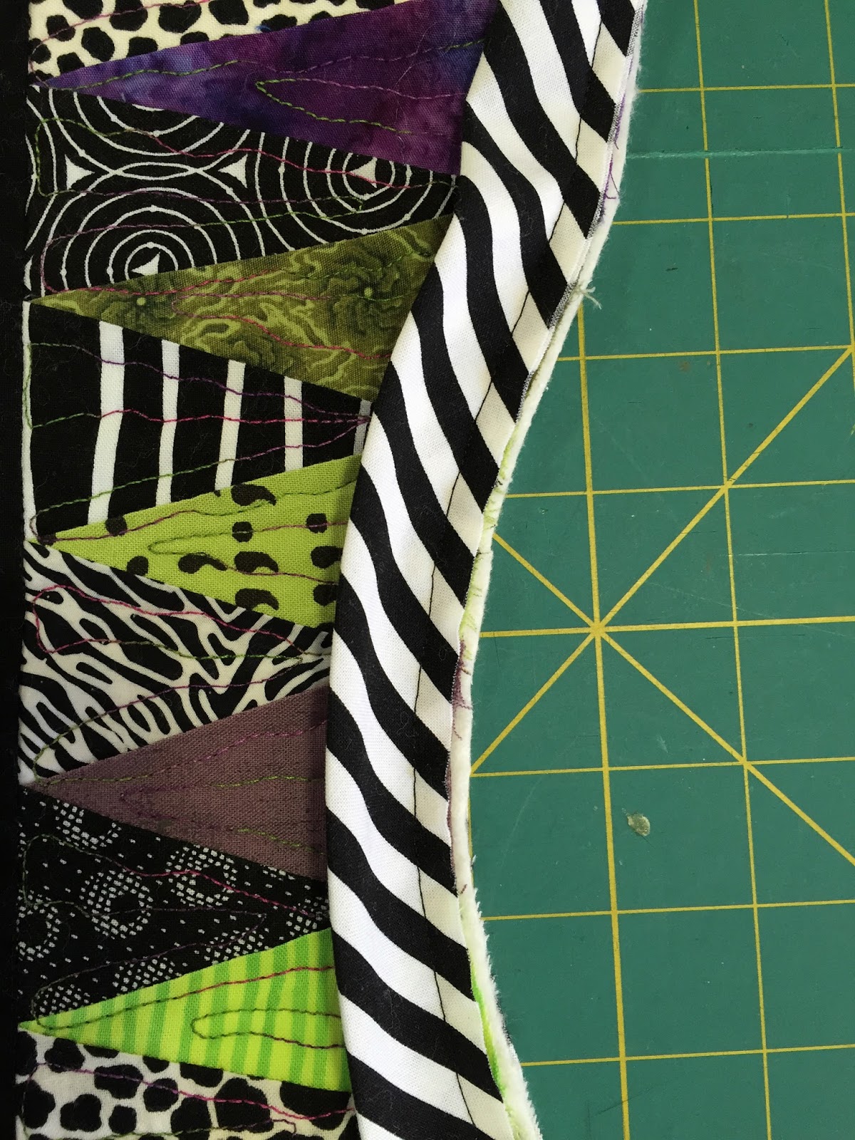 She Quilts It Binding on curved edged quilts