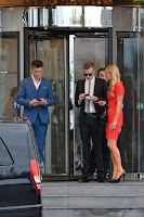 Paris Hilton in front of her hotel