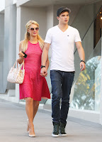 Paris Hilton holding hands with boyfriend River Viiperi