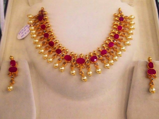 Jewellery Designs Designer Uncut Diamond Set With Rubies And Sea Pearls - Ruby Uncut Diamond Pendant Jewellery Designs Designer Uncut Diamond Set With Rubies And Sea Pearls - Ruby Uncut Diamond Pendant