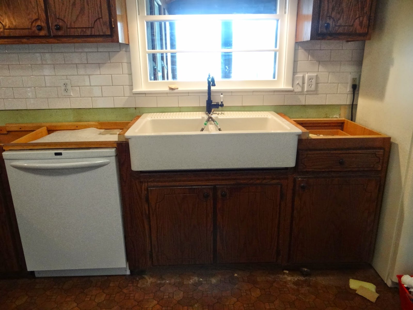 gallery of one project at a time diy blog installing an ikea domsjo sink with desk height base cabinets