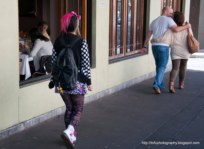  hair and a loving couple in king street newtown sydney in may 2011 title=