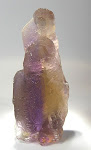 7.4 x 3.3 x 2.9 cm. A floater crystal of "ametrine" quartz from Bolivia - combining the golden