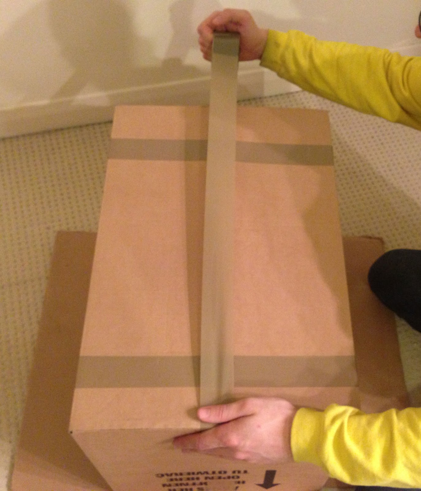 How to tape up a box for removals We Like 2 Move It Removals Hereford