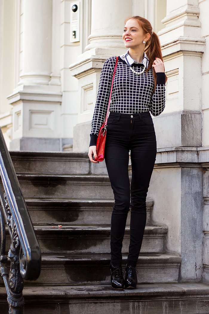 Fashion blogger outfit in preppy style with a print mix of grid, checks and polka dots