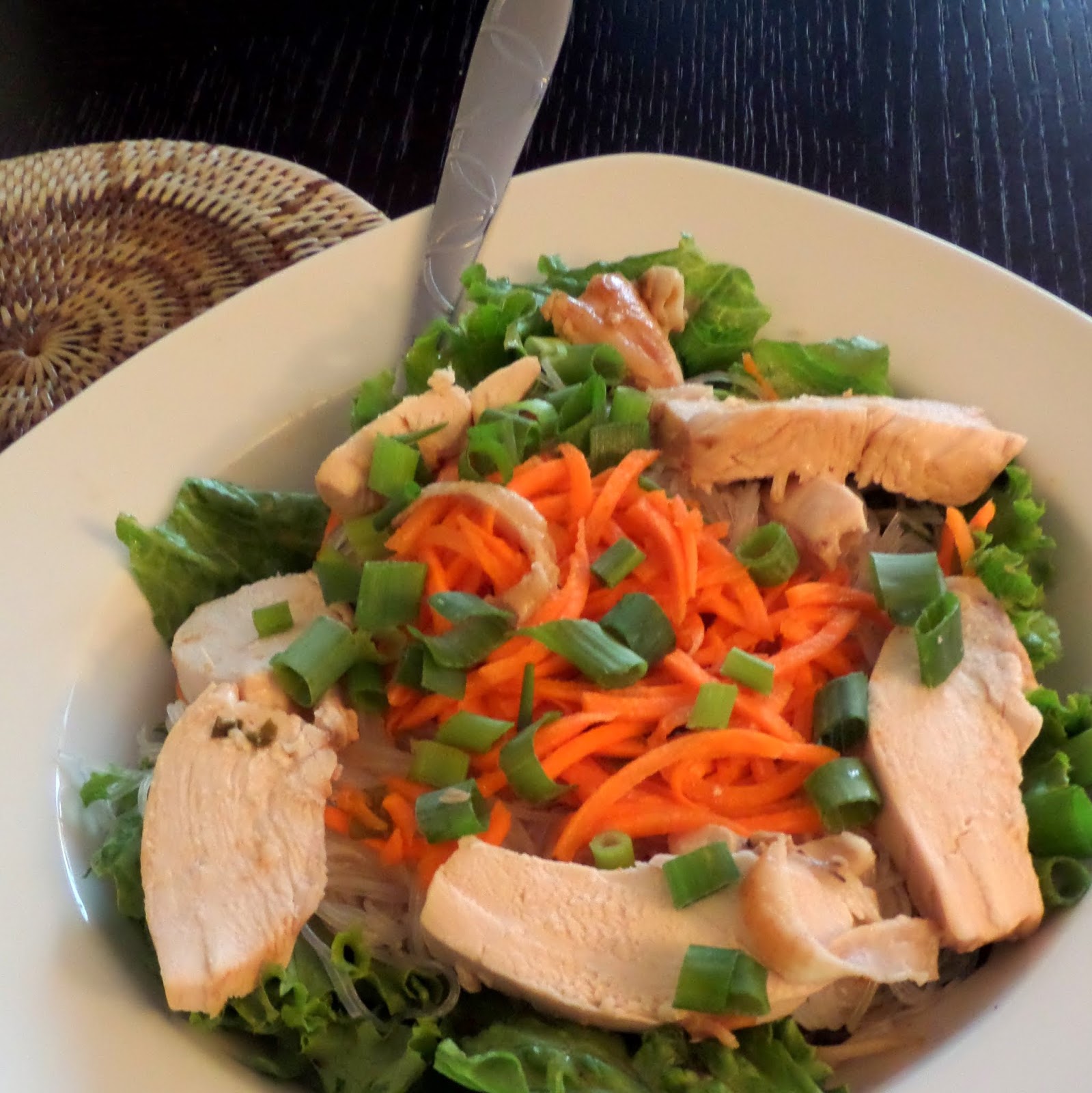 Lemongrass Chicken Vermicelli:  A fresh salad with herbs, vegetables, and rice noodles topped with juicy chicken flavored with lemongrass and other southeast Asian flavors.