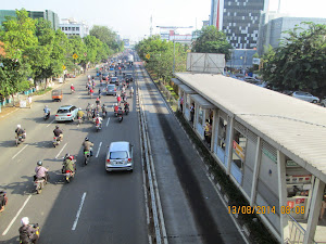 "JAKARTA SHUTTLE BUS station " road tracks.