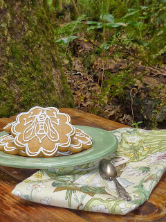 woodland tea with honey-vanilla bee cookies and moss on tree