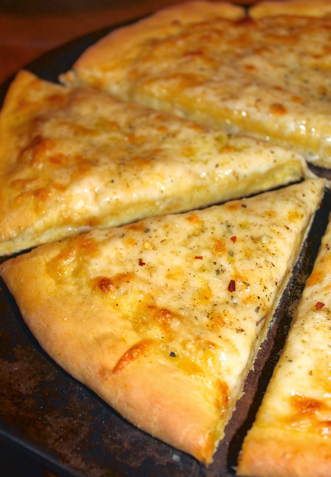 Savory Moments Three cheesegarlic pizza on pumpkin pizza dough