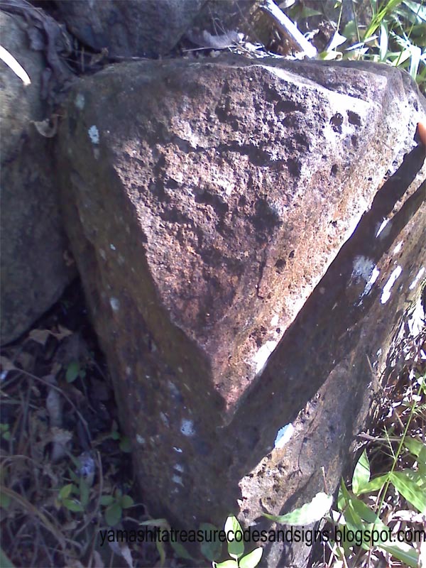 A Triangle Rock or like a Birds Head Yamashita Treasure Codes and Signs