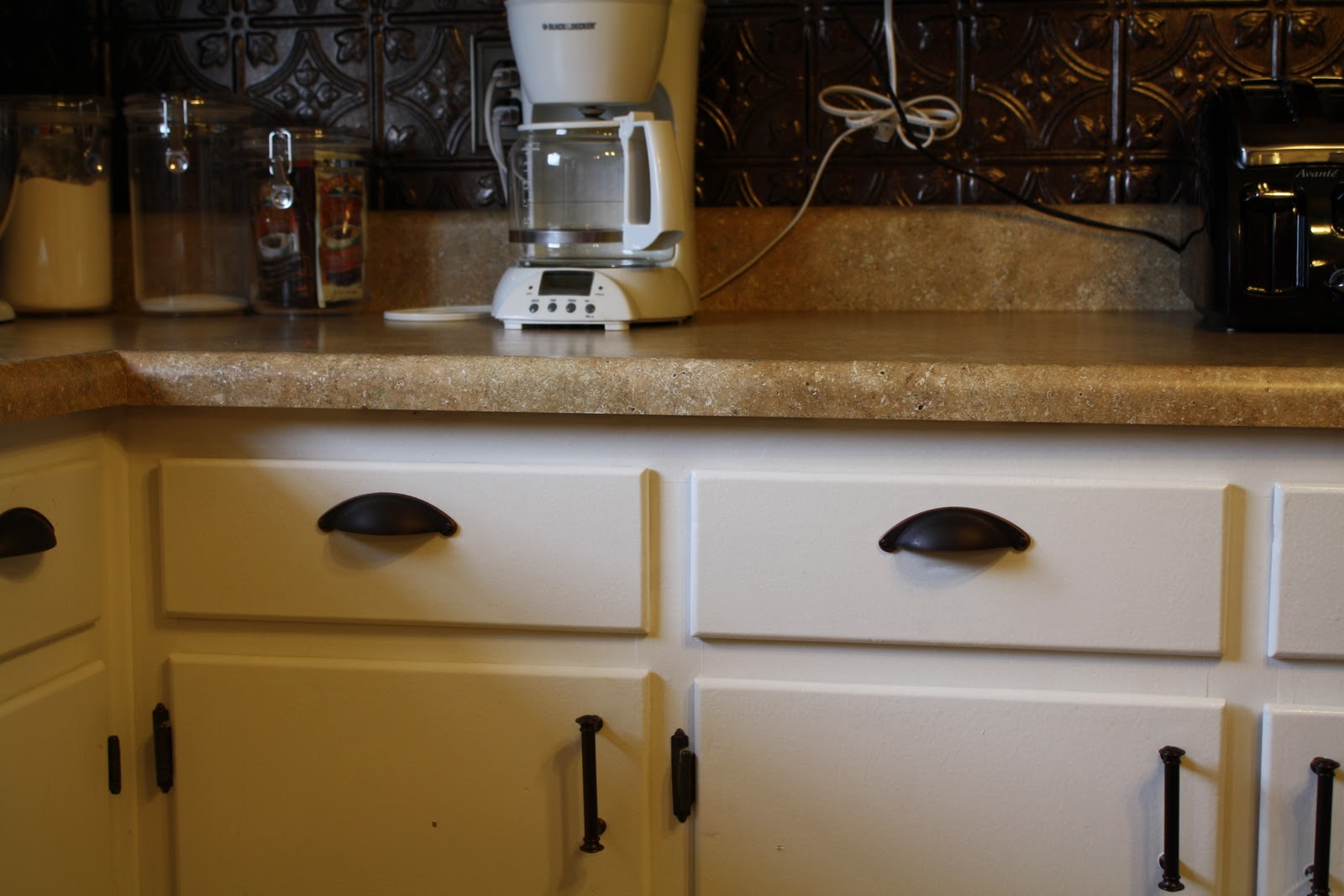 Lowes white kitchen cabinets We really like our new hardware too!! It's from Lowe's.