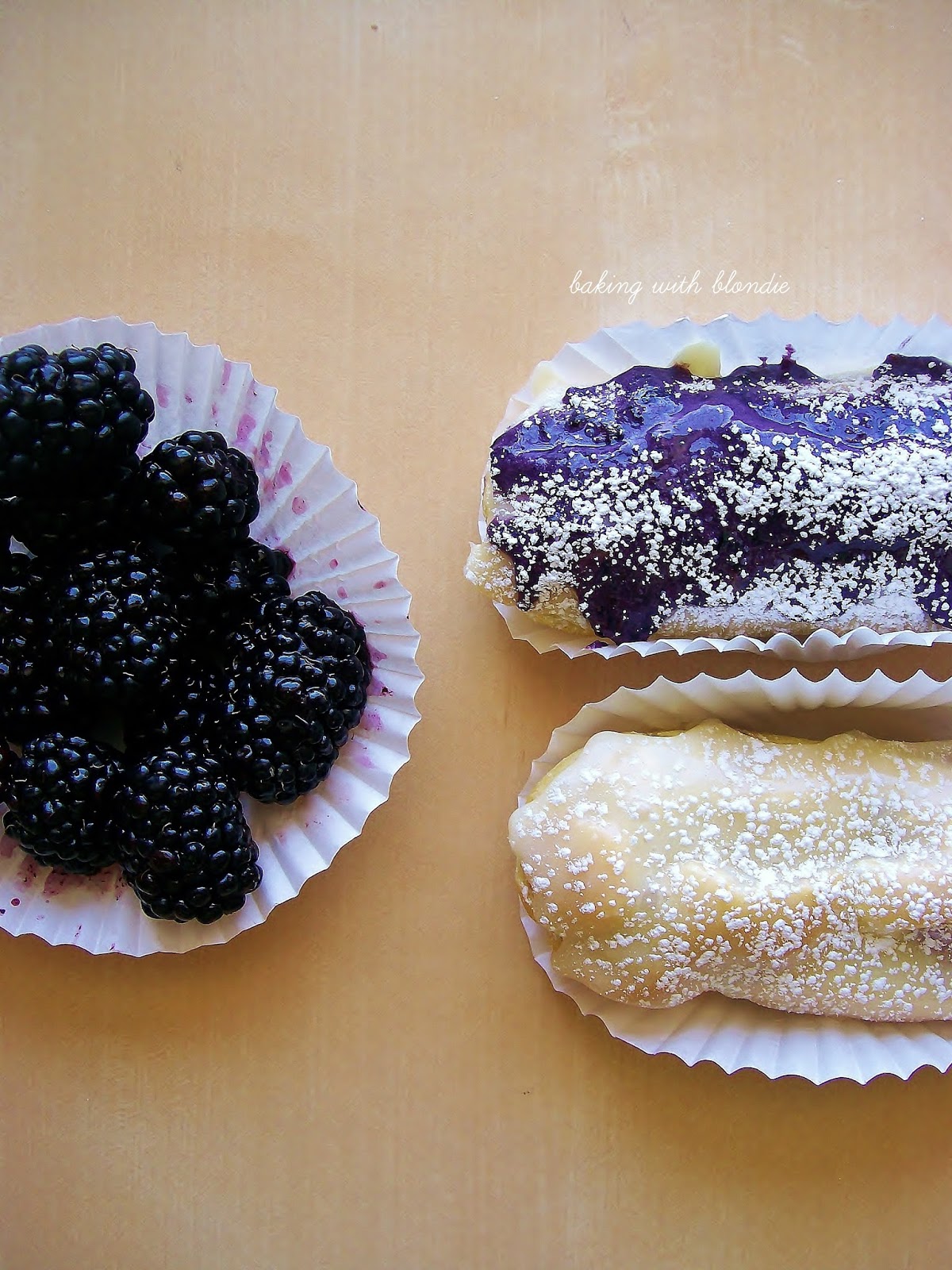 Blackberry Cream Filled Eclairs with White Chocolate Cream Cheese Sauce