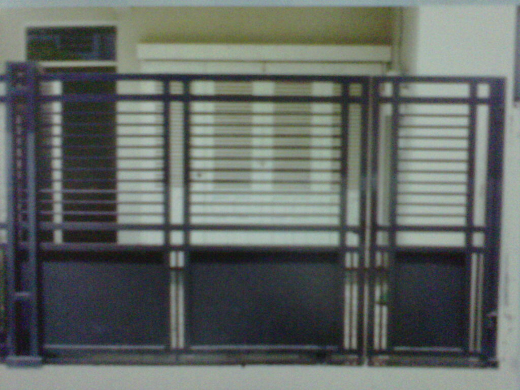 teralis minimalis pintu pagar besi