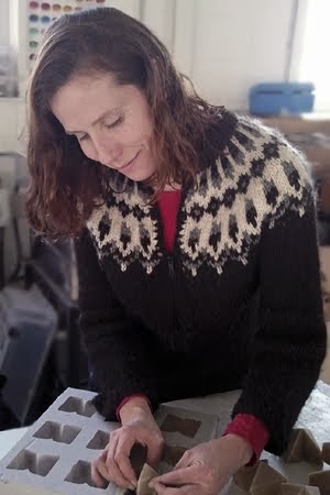 Georgia, working with a mould