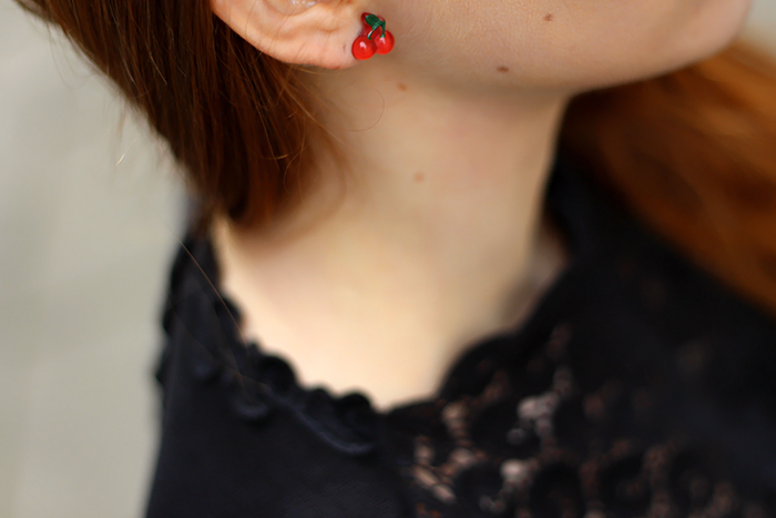 fashion blogger outfit detail shot cherry earrings