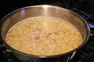 Simmering pasta and pancetta soup