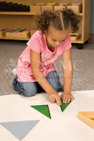 child playing with shapes mat NAMC montessori perspectives what is normalization